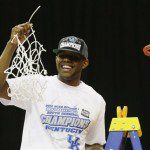 Kentucky's Darius Miller holds the net after cutting it down after an NCAA tournament South Regional finals college basketball game against Baylor Sunday, March 25, 2012, in Atlanta. Kentucky won 82-70. (AP Photo/David J. Phillip)